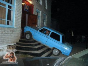 Car climbs the stair and almost enters the main gate